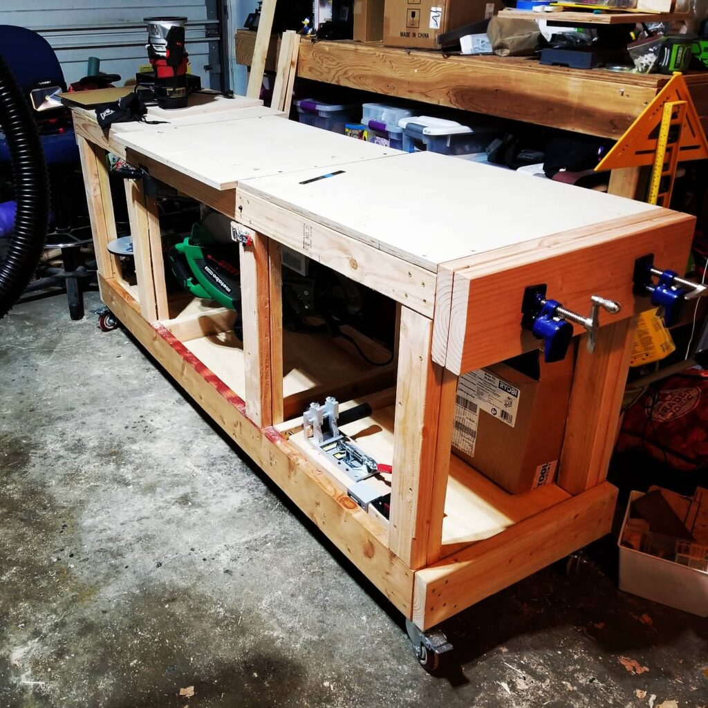 In this pic you can see that I have not secured the center plywood top, not installed the caster below the 4 center posts.  They are necessary or the beams might warp.  You can also see the old craftsman router on the far table top panel as I was contemplating putting it into the whole shebang on this Miter Saw Stand.